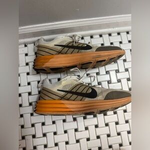 Nike Cream and Orange Running Shoes